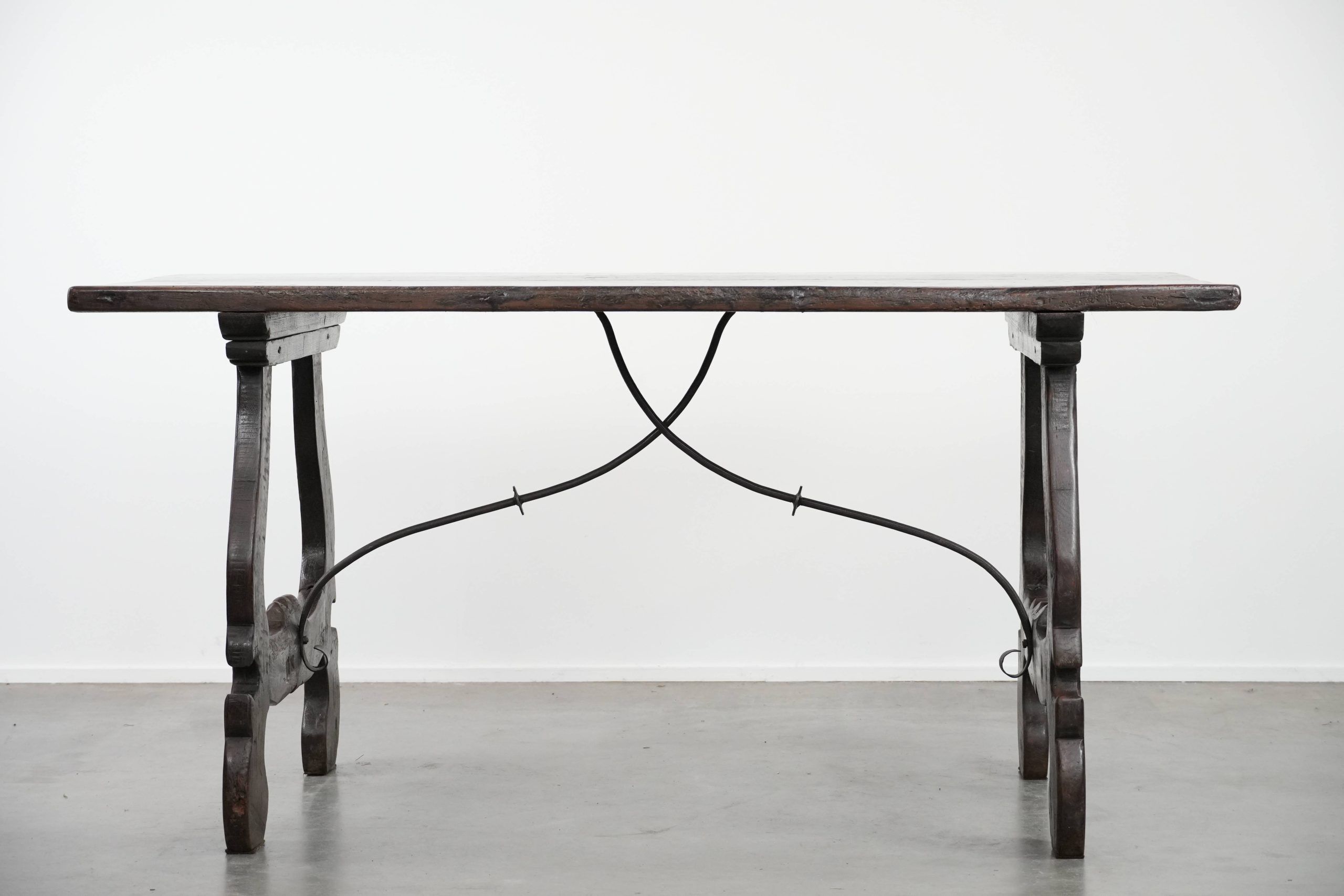 Antique Spanish table from the early 18th century with  a cast iron base