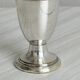 Small soliflore vase in very light metal.