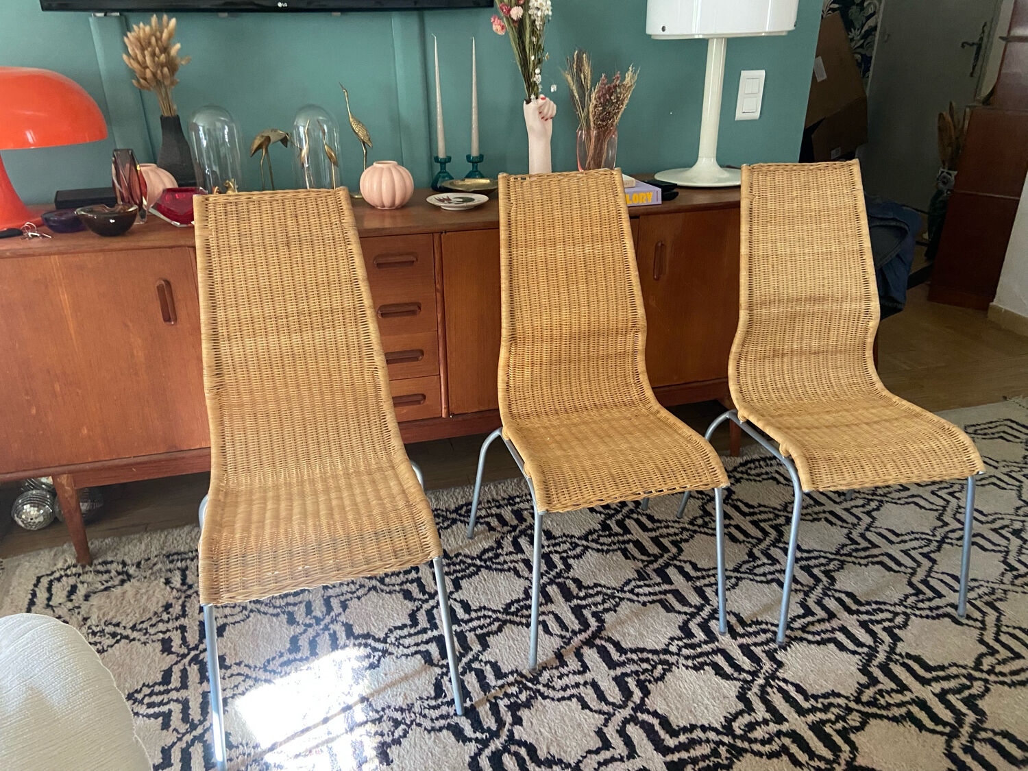 Trio of vintage Ikea rattan and aluminum chairs