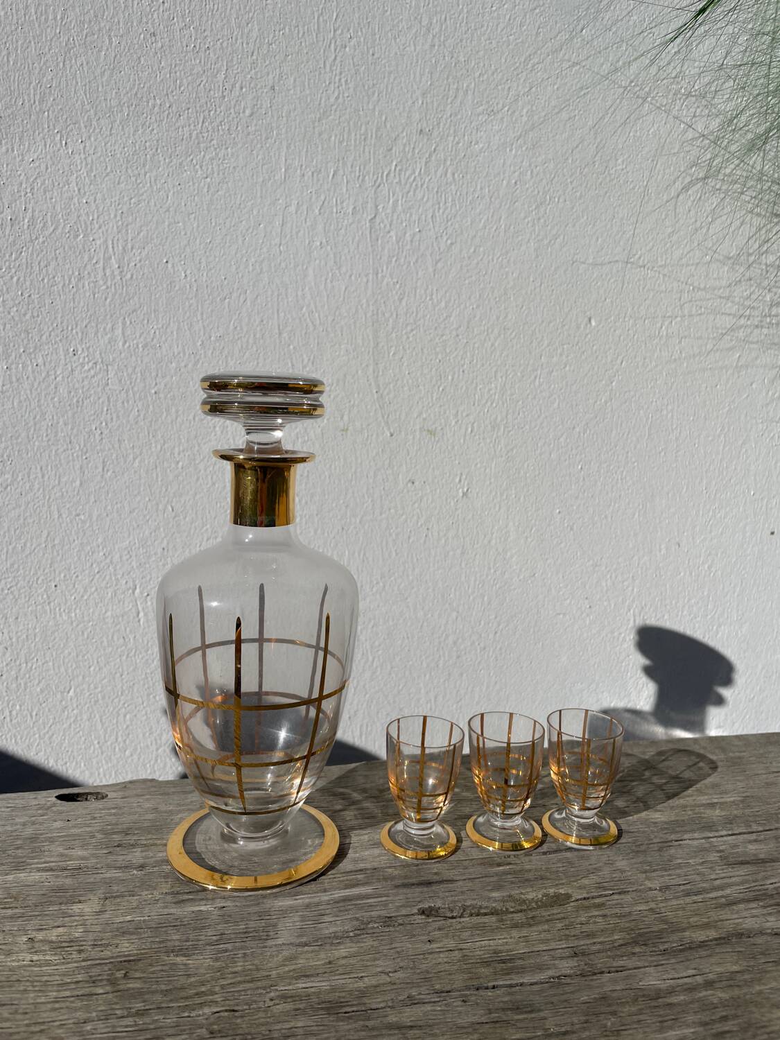 Art Deco glass and gold carafe or vase from the 1950s.