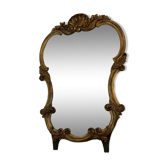 Large wall mirror with a gilded brass frame in Louis XV style.