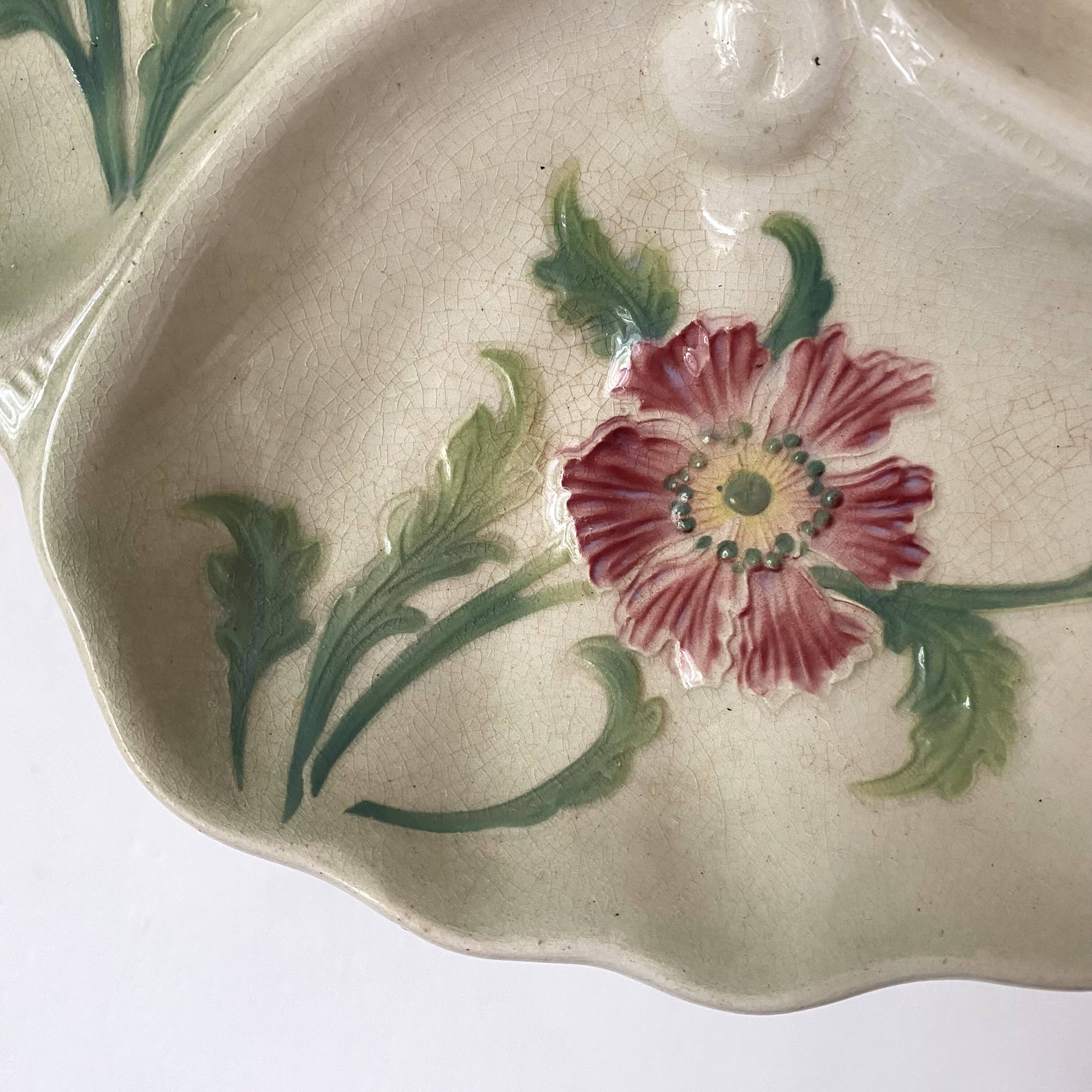 Art Nouveau slip dish with poppy decoration