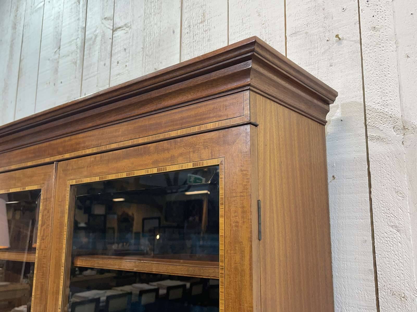 English two-piece mahogany bookcase from the 1950s