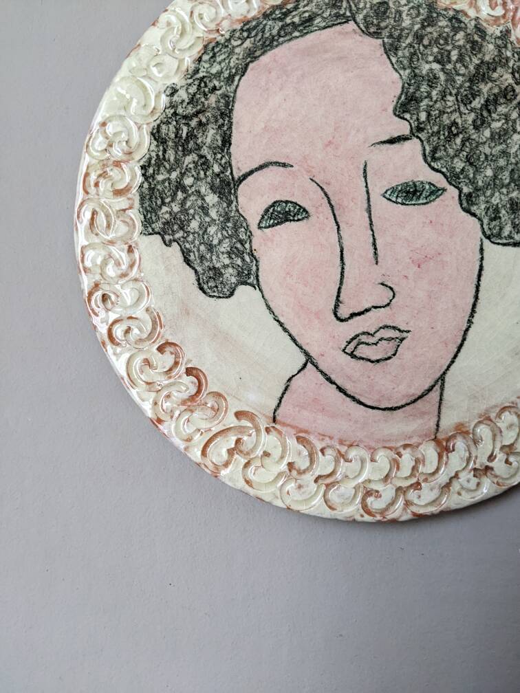 Handmade ceramic wall hanging portrait enameled medallion