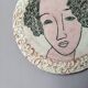 Handmade ceramic wall hanging portrait enameled medallion
