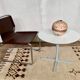 Table basse vintage guéridon rond  piétement étoile en fonte d'aluminium année 1980