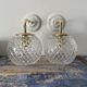 Set of two new electrified chiseled glass globe sconces
