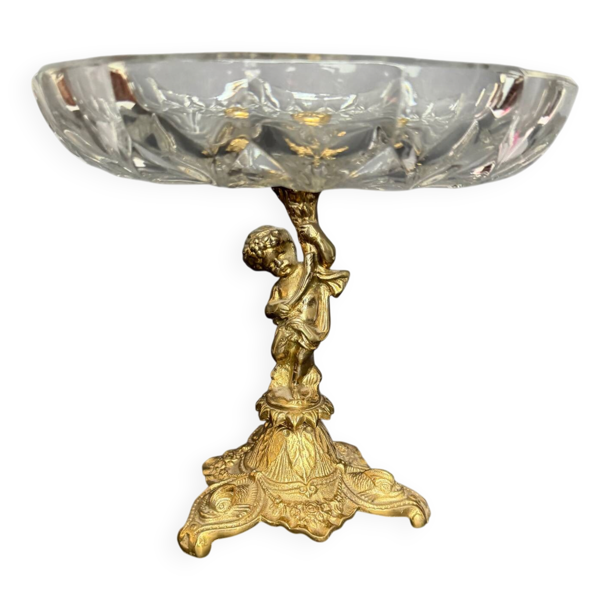 Antique crystal bowl on a bronze stand.