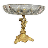 Antique crystal bowl on a bronze stand.