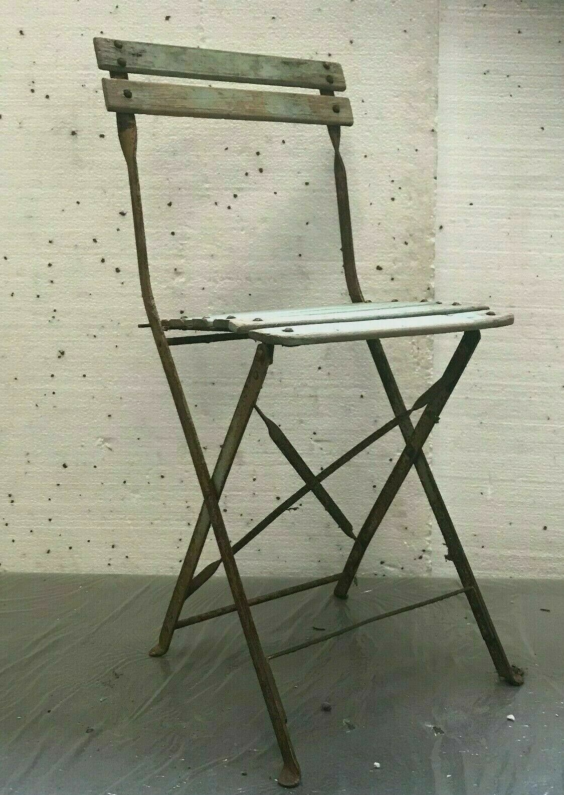 Folding chairs in iron and wooden blade XX century