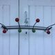 Roger Feraud wall-mounted wooden coat rack with colored balls, 1950