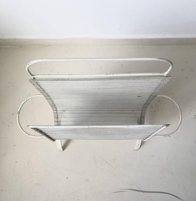Modernist magazine rack by Mathieu Matégot to 1952