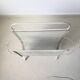 Modernist magazine rack by Mathieu Matégot to 1952