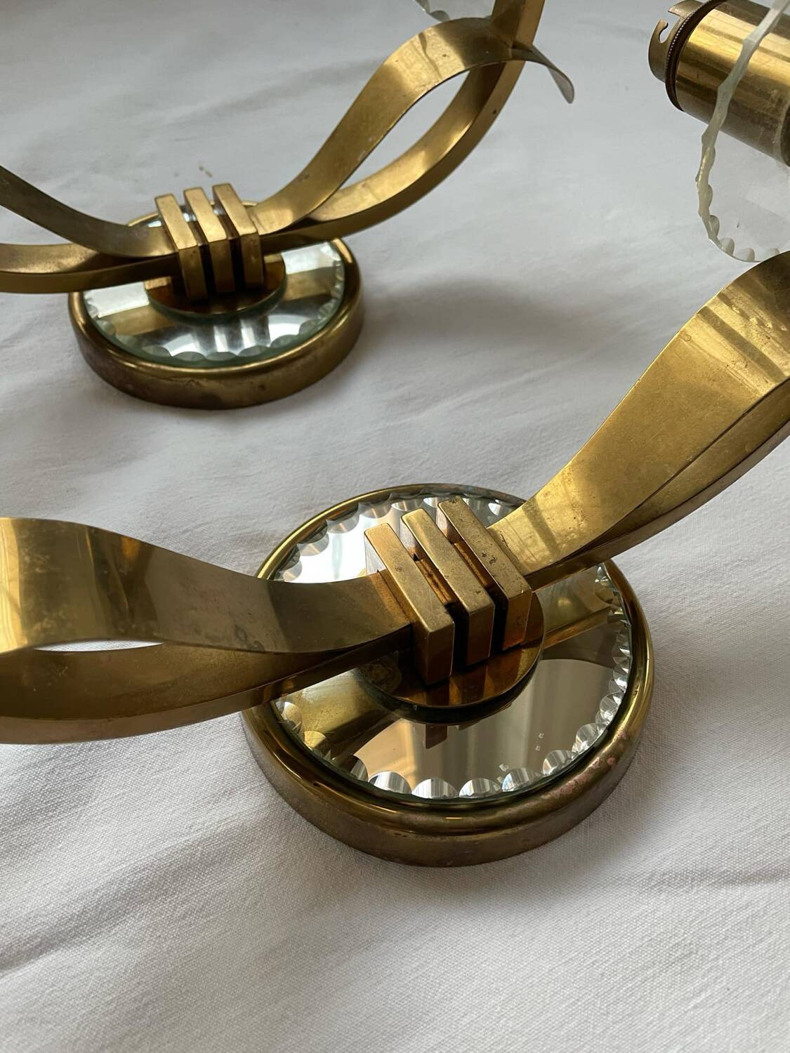 Vintage pair of art deco brass and mirrored glass wall lights France 1940