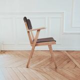 Renovated vintage armchair, bridge from the 1950s.