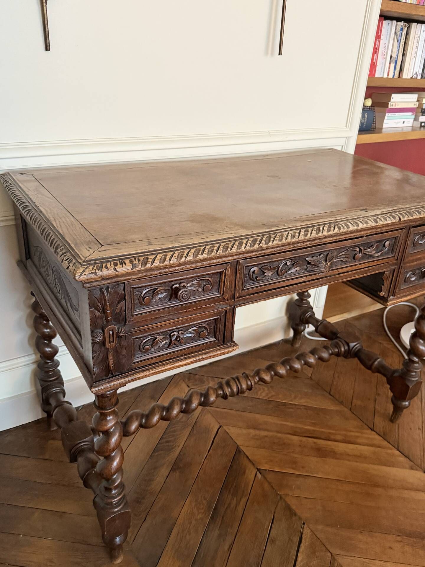 Louis XIII oak writing desk with carved twisted legs, late 19th century.