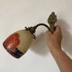 Antique bronze and glass paste wall light