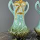 Pair of Art Nouveau vases in glazed ceramic with floral decoration, 20th Century