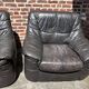 Pair of patinated leather club armchairs