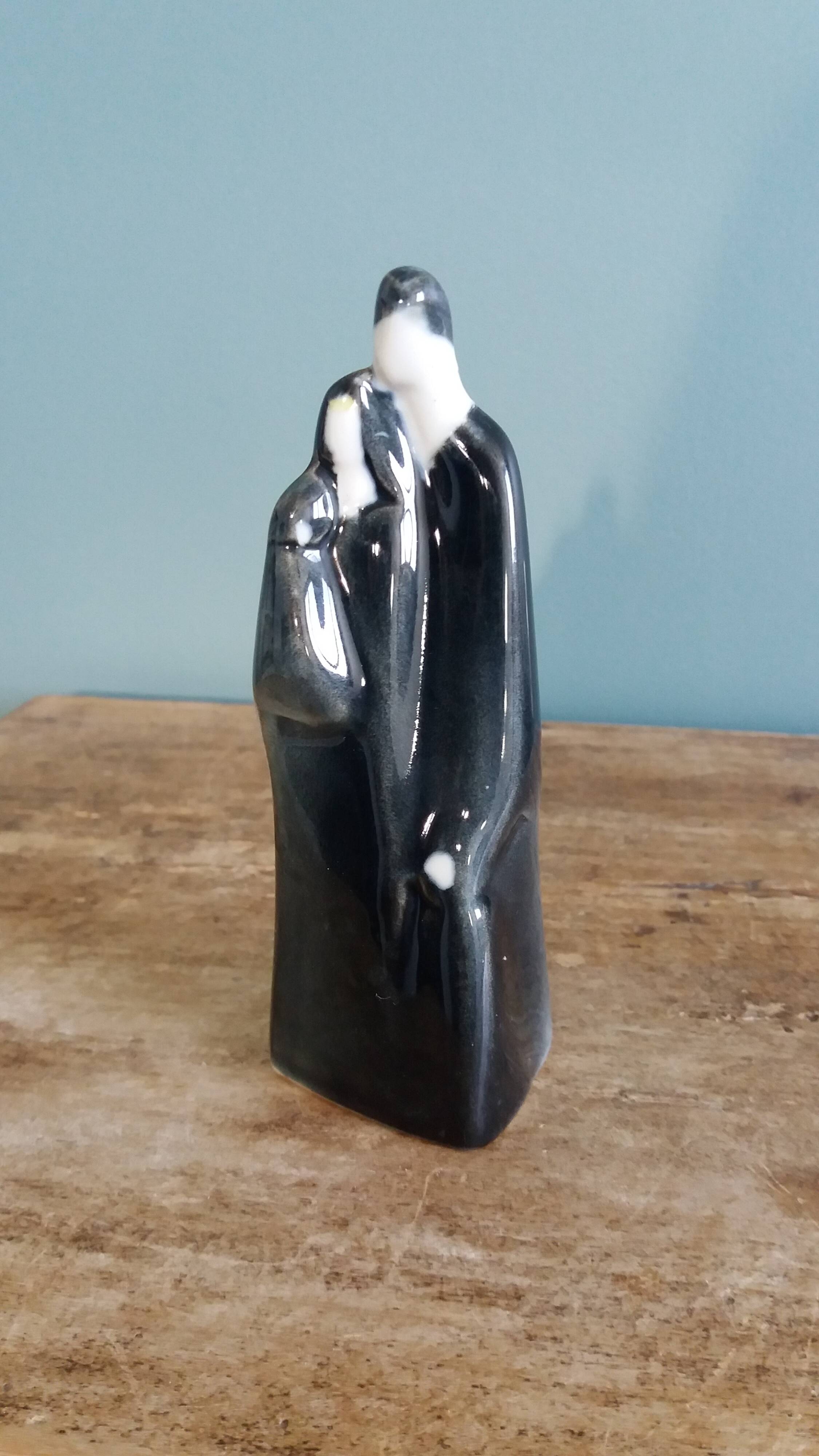 Porcelain sculpture signed Hassan Heshmat, Egypt