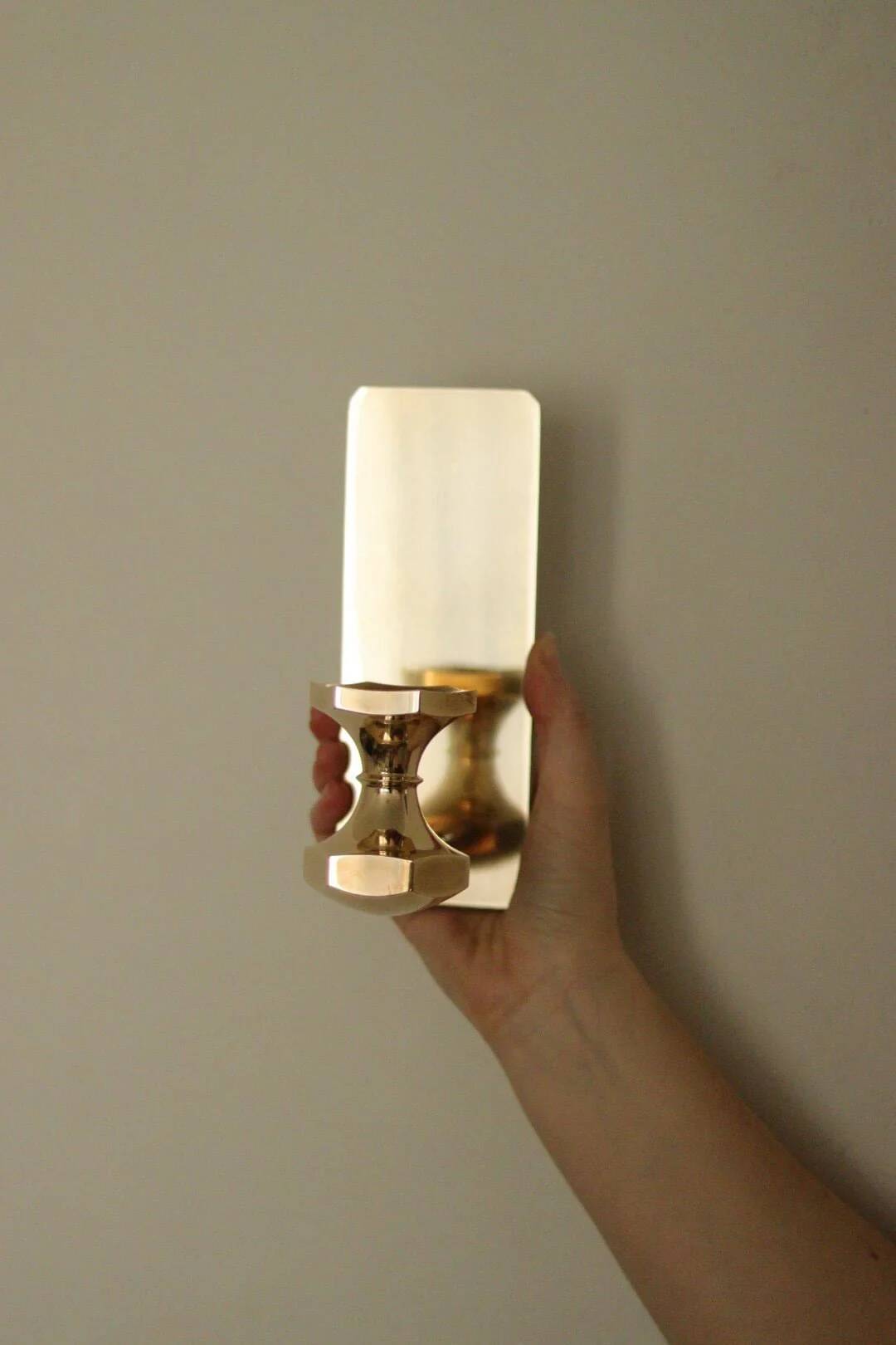 1988, single mid-century Swedish brass sconce by Gusum