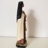 religious statue of Saint Therese of Lisieux in painted plaster