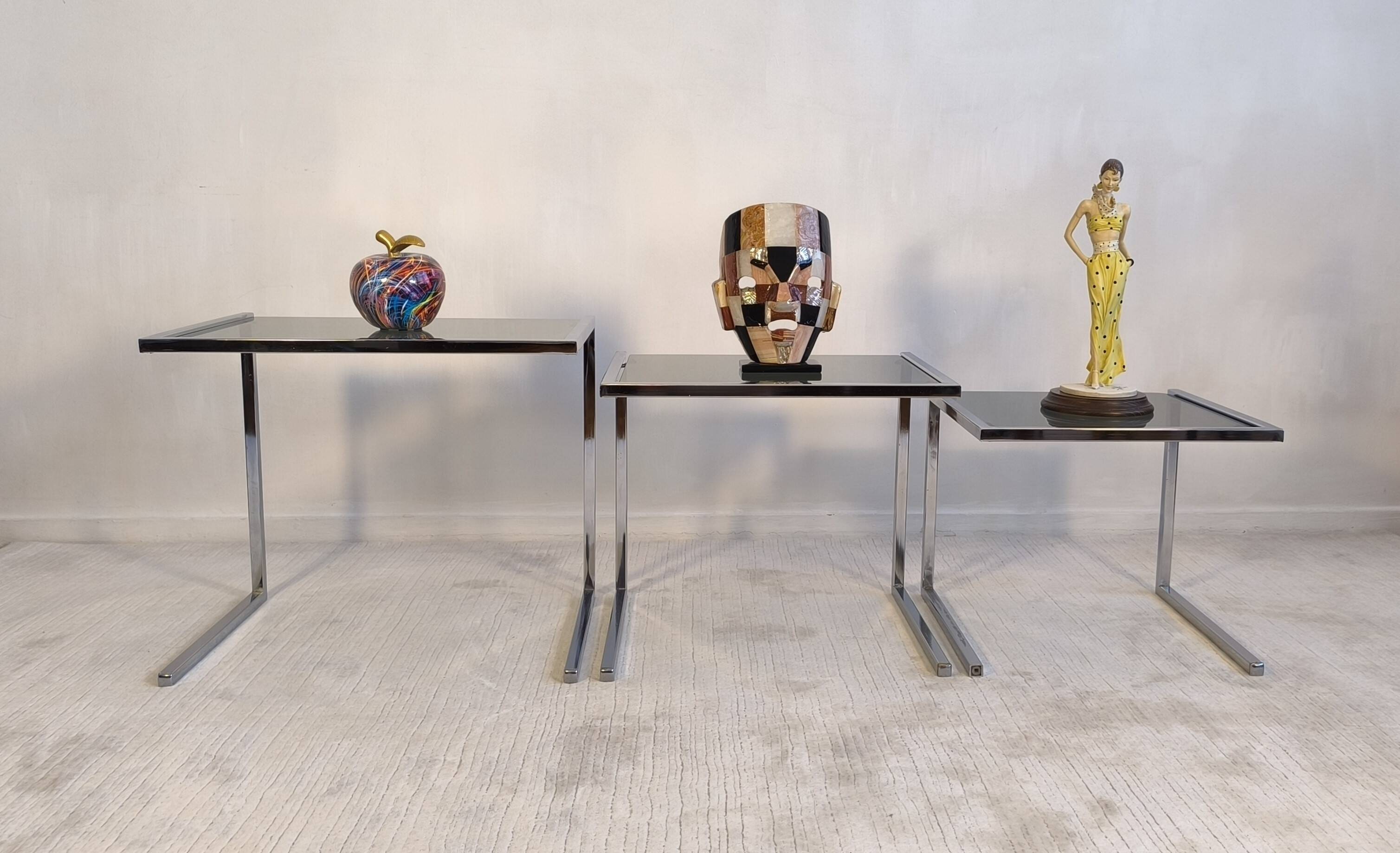 Set of 3 vintage nesting tables in chrome and smoked glass, Roche Bobois style.