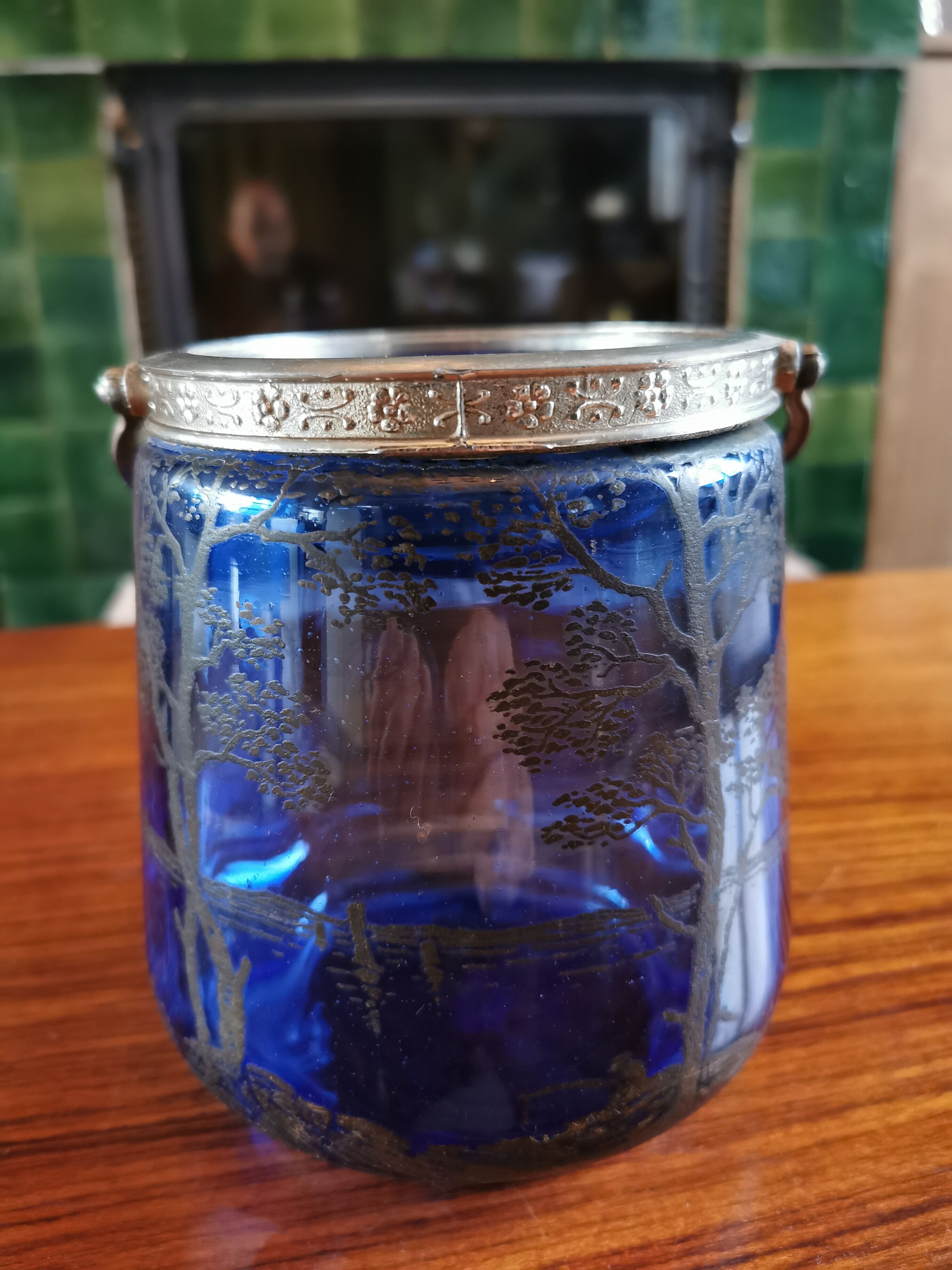 Old ice or biscuit bucket made of golden decor blue glass