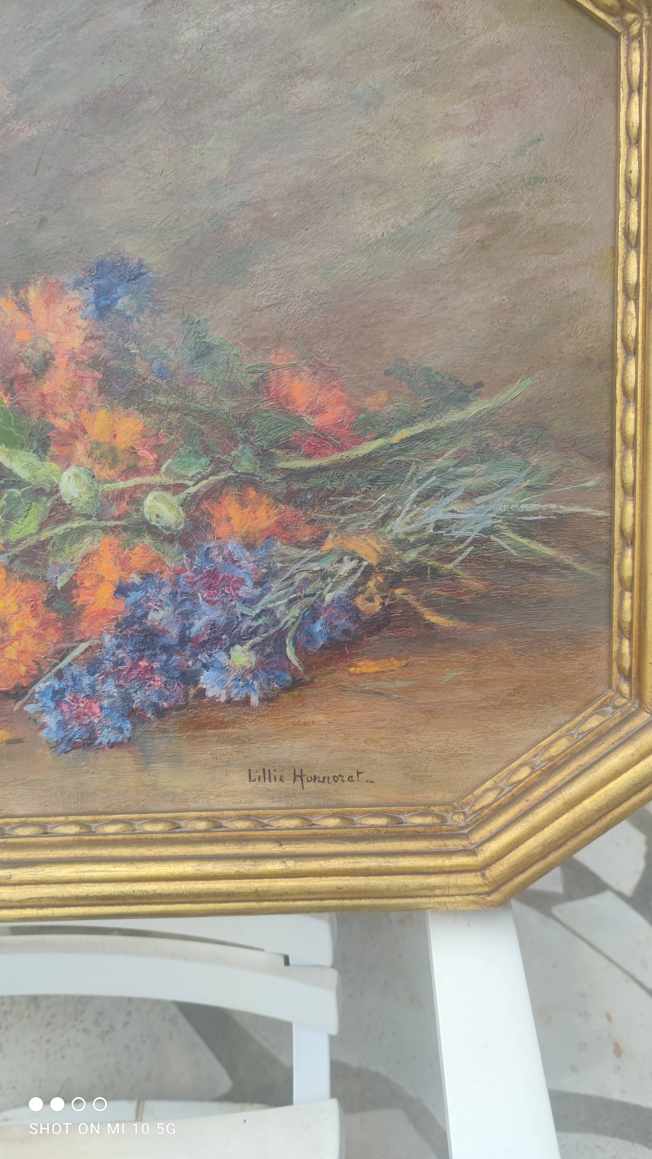 Still life bouquet of flowers, oil on wood by Lillie Honnorat