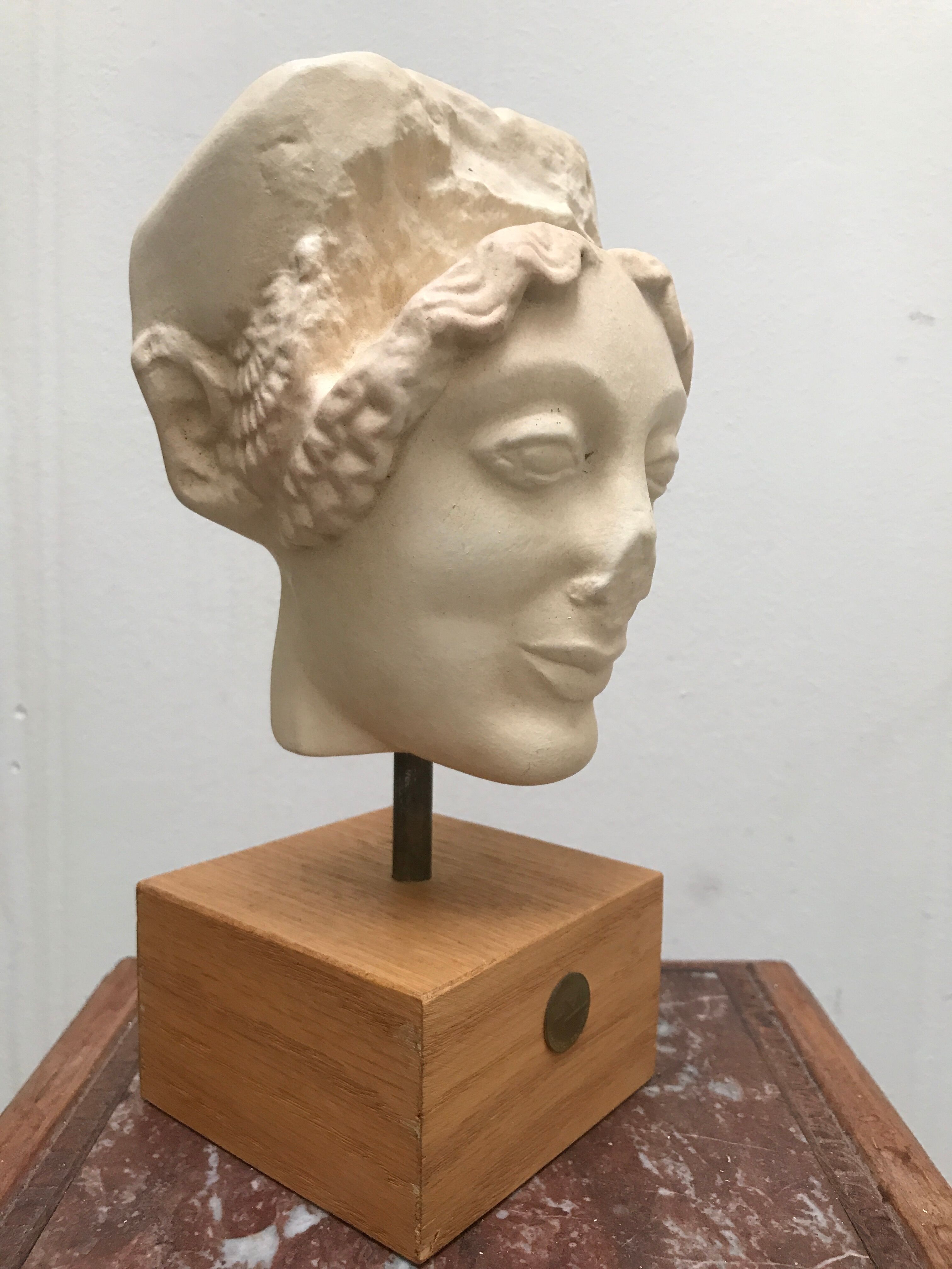 Bust head of ancient woman