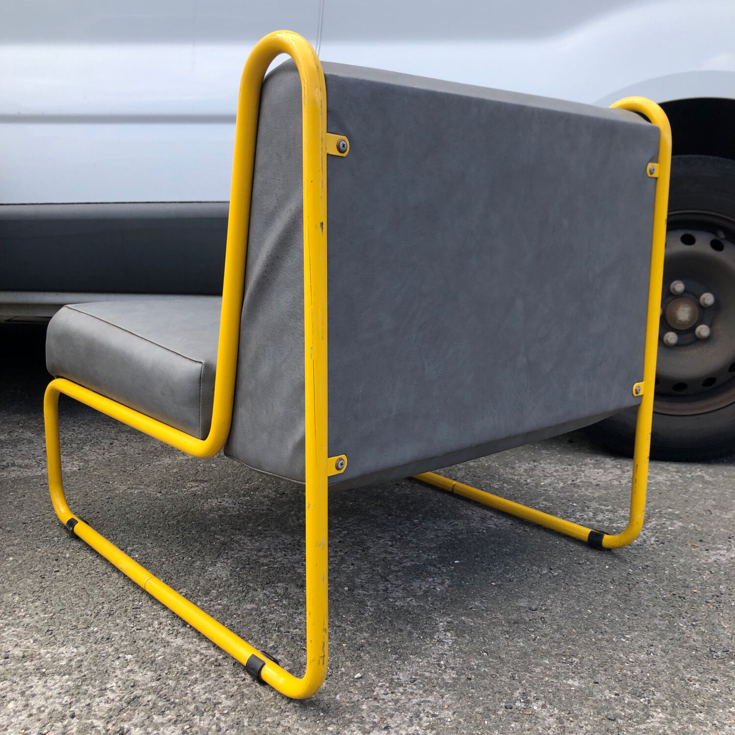 Pair of designer armchairs by Henri Julien