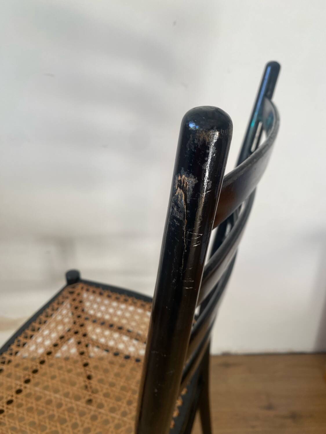 Light wooden chair with caning