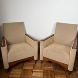 Pair of armchairs in carved wood and vintage fabric