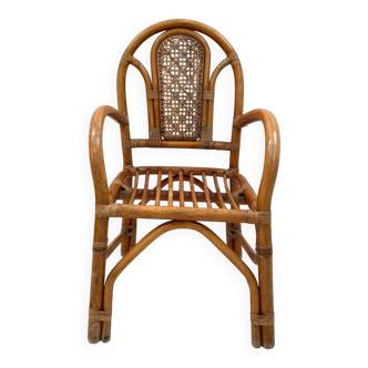 Vintage rattan and bamboo armchair from the 1970s.