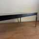Grande table basse design années 70 chrome, verre fumé et skaï