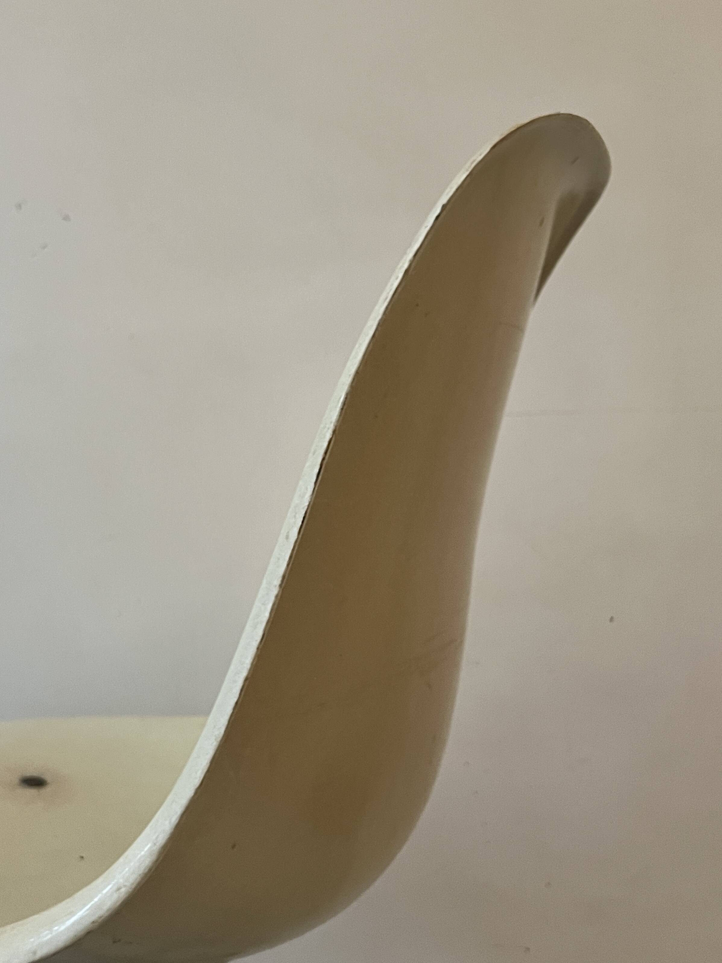 Ecru fibreglass wheelchair by H. Miller for International Furniture