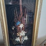 Frame of plants and edelweiss signed.