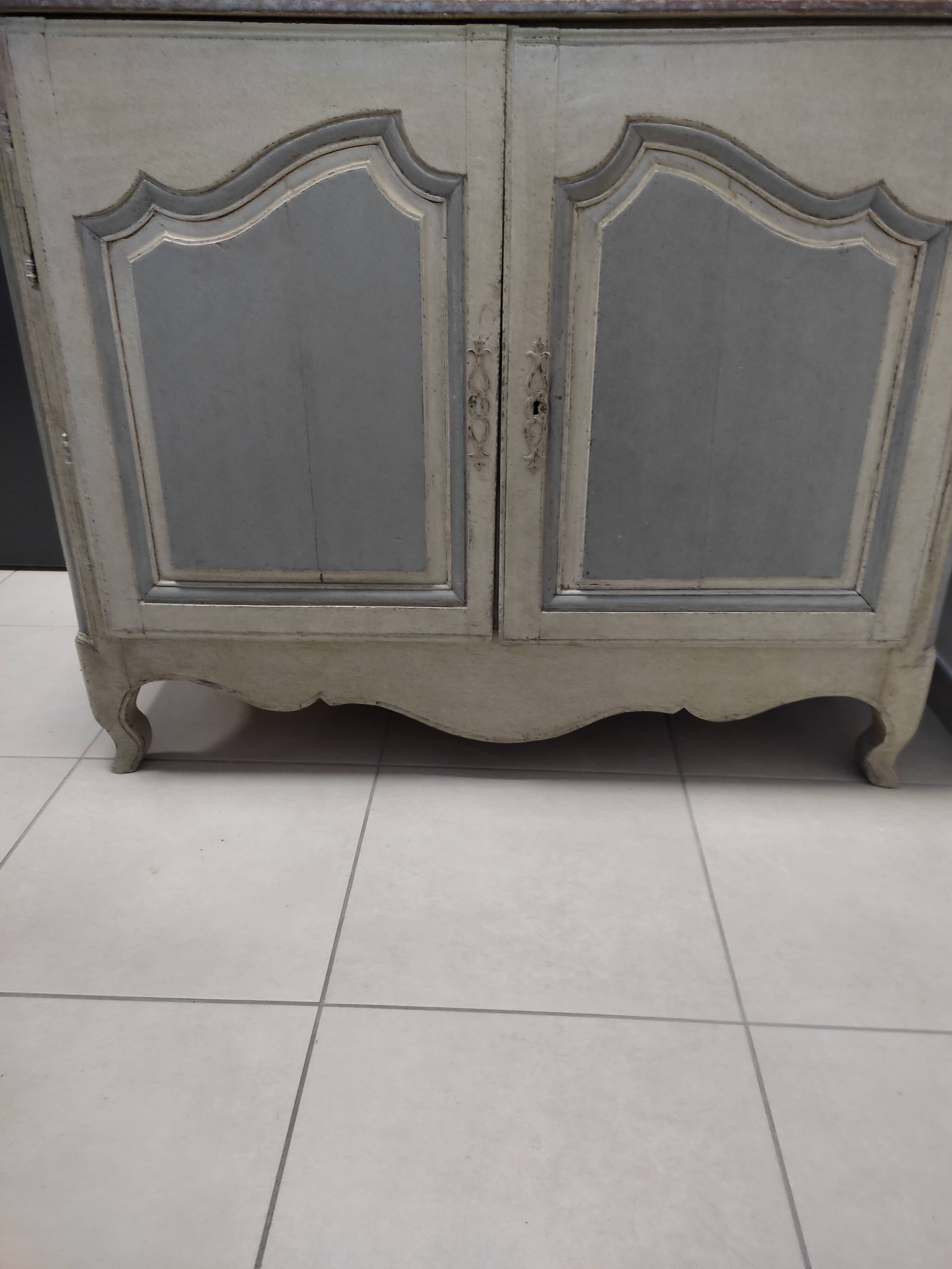 Patinated Louis XVI low era buffet