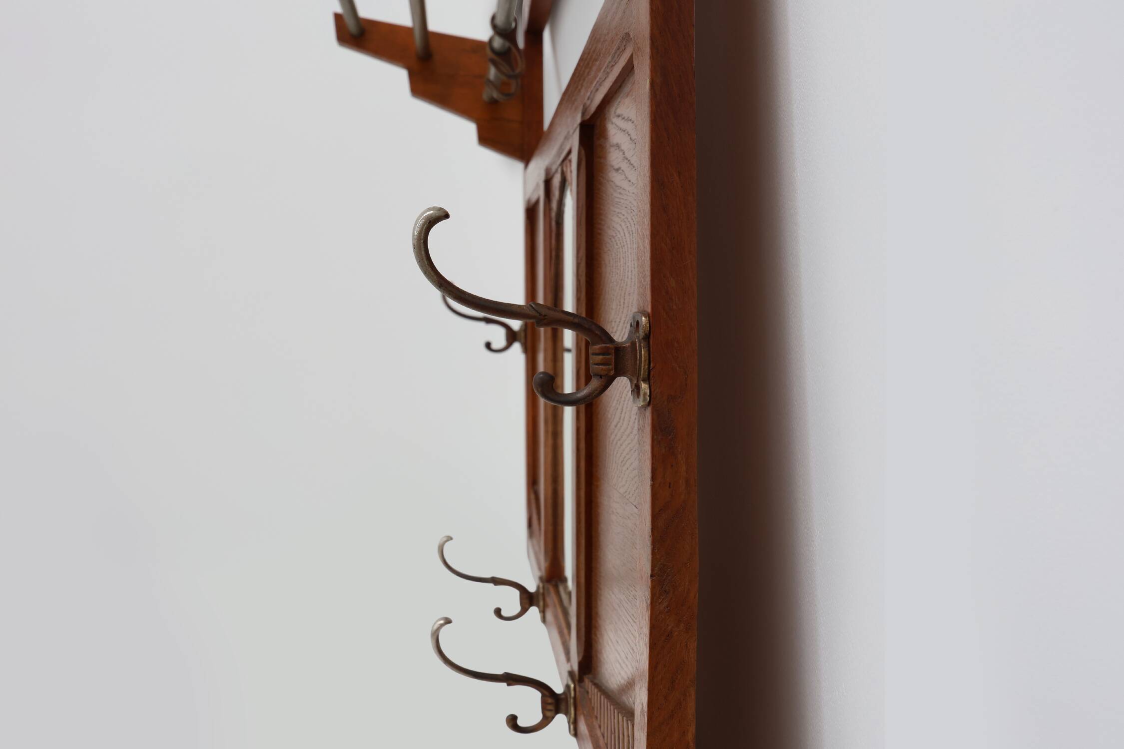 Art Deco oak carved wall coatrack with mirror, France 1920s