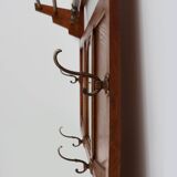 Art Deco oak carved wall coatrack with mirror, France 1920s