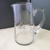 Jug, water decanter or fruit juice in grinded glass