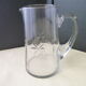 Jug, water decanter or fruit juice in grinded glass