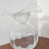Glass ball vase with corolla