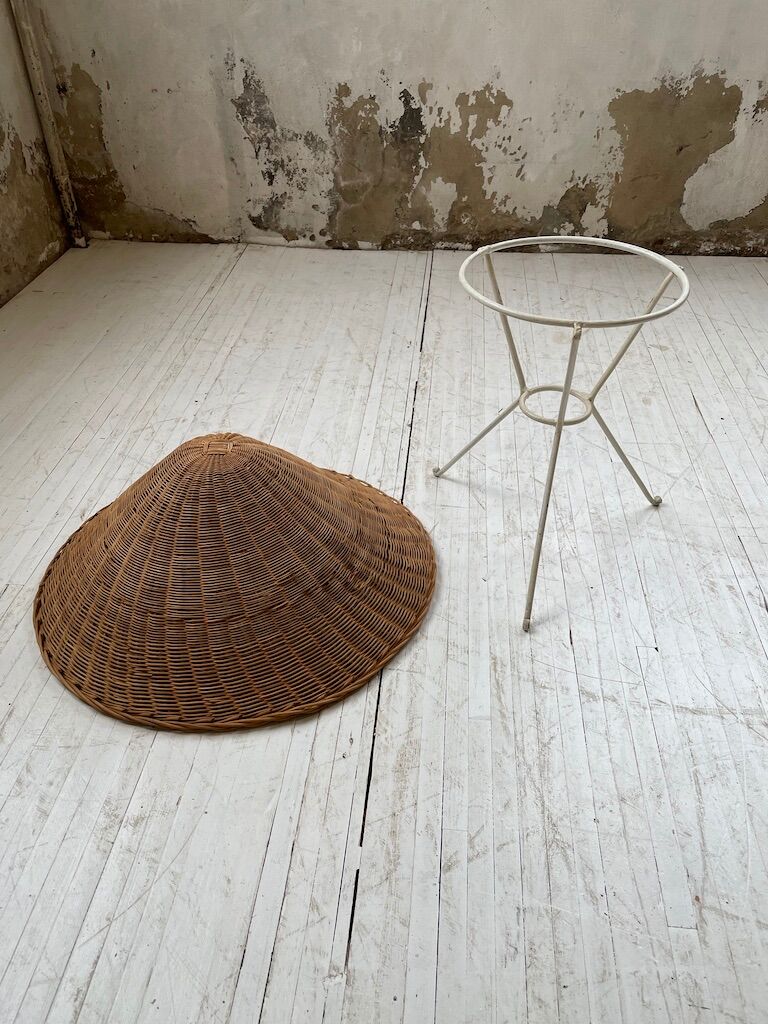 Wicker garden basket on tripod support