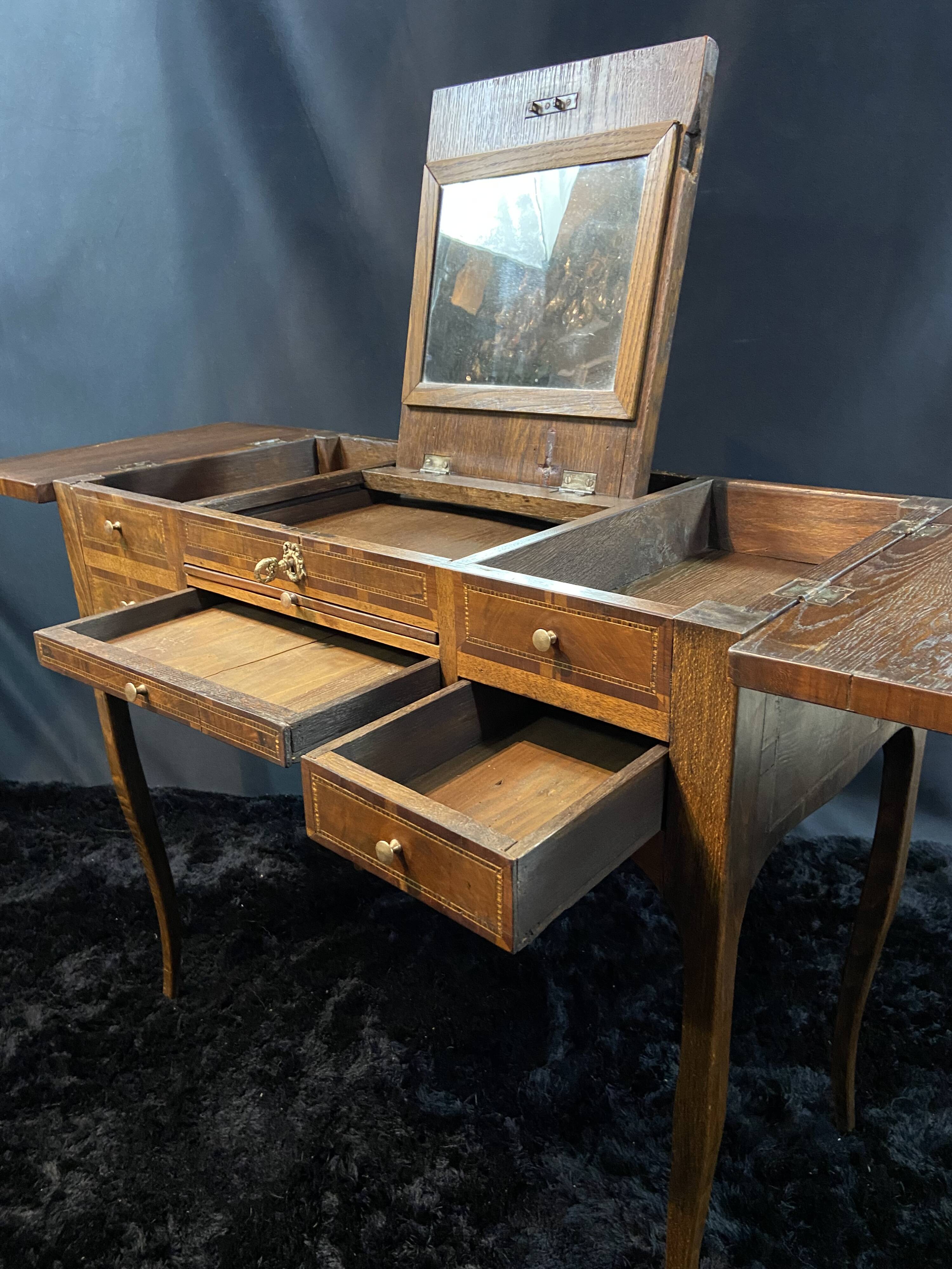 19th-century hairdresser with marquetry decoration on oak in the Louis XV Transition style.