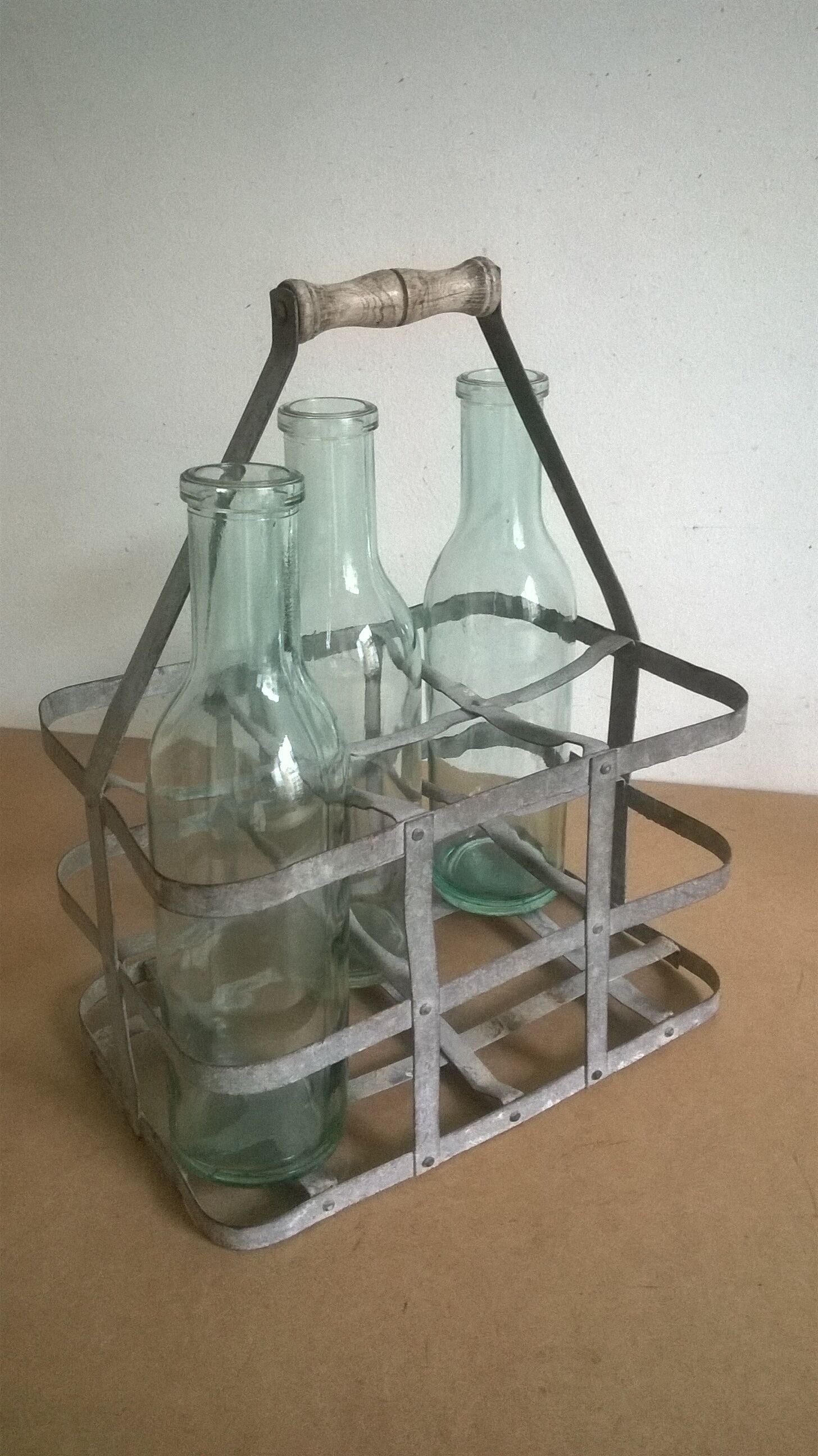 Old bottle rack in zinc