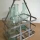 Old bottle rack in zinc