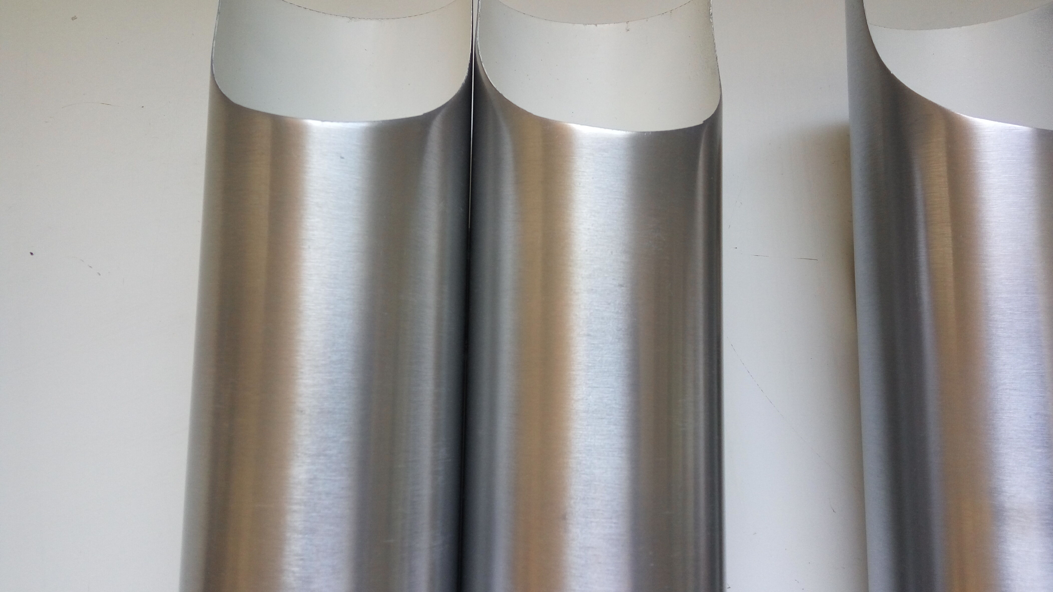 Pair of wall sconces by Fugue Raak