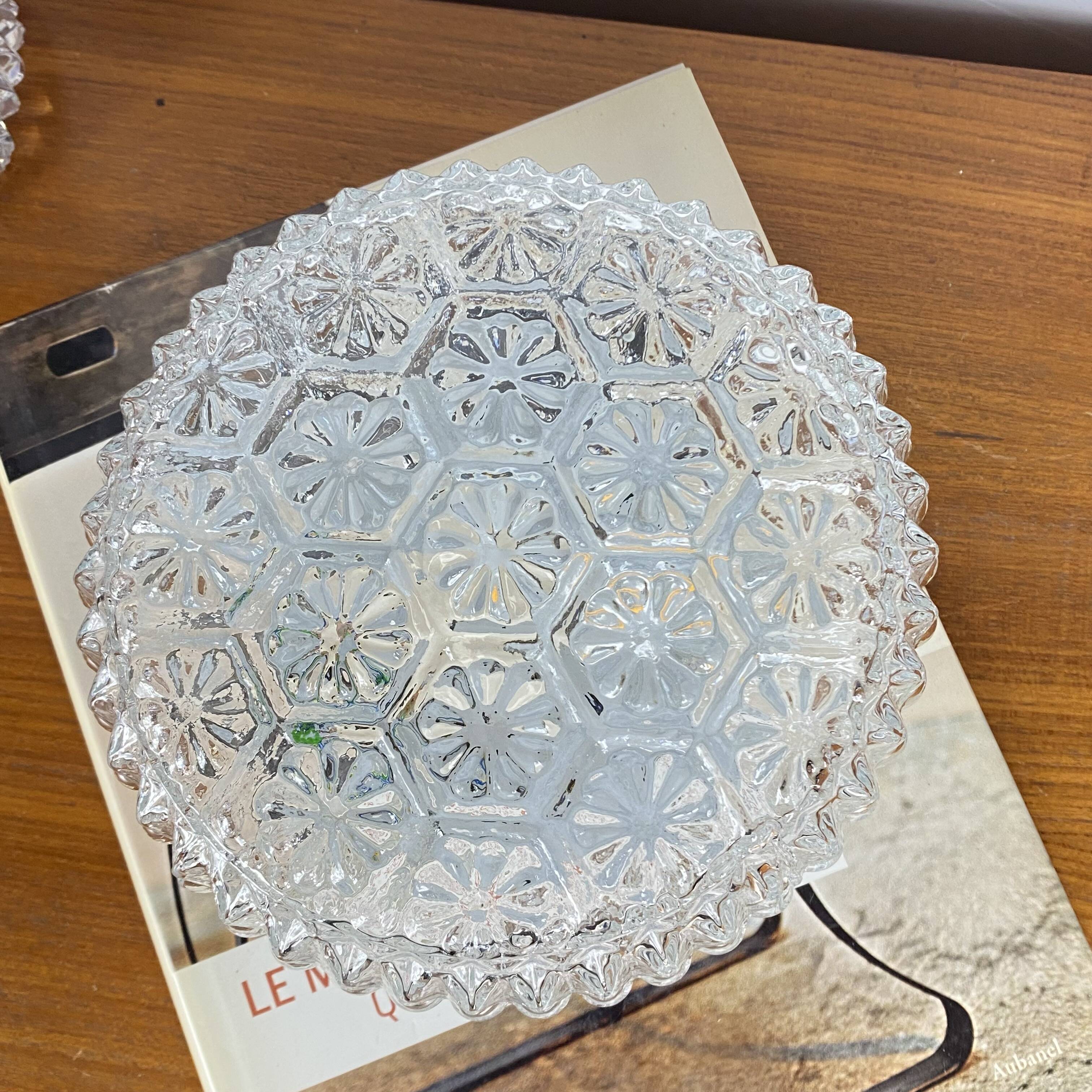 Round wall light ceiling fixture in glass with small vintage flowers from the 1970s and 1980s.