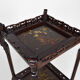Japanese pedestal table in carved wood and lacquered panels, France, circa 1880